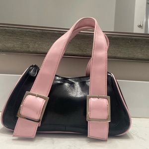 pink and black handbag